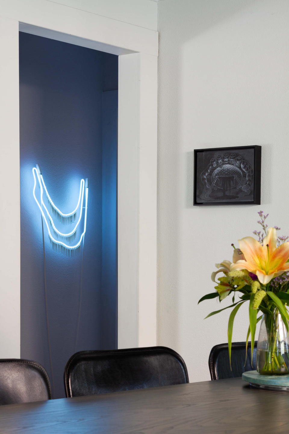 Artwork decorating the walls of a home.