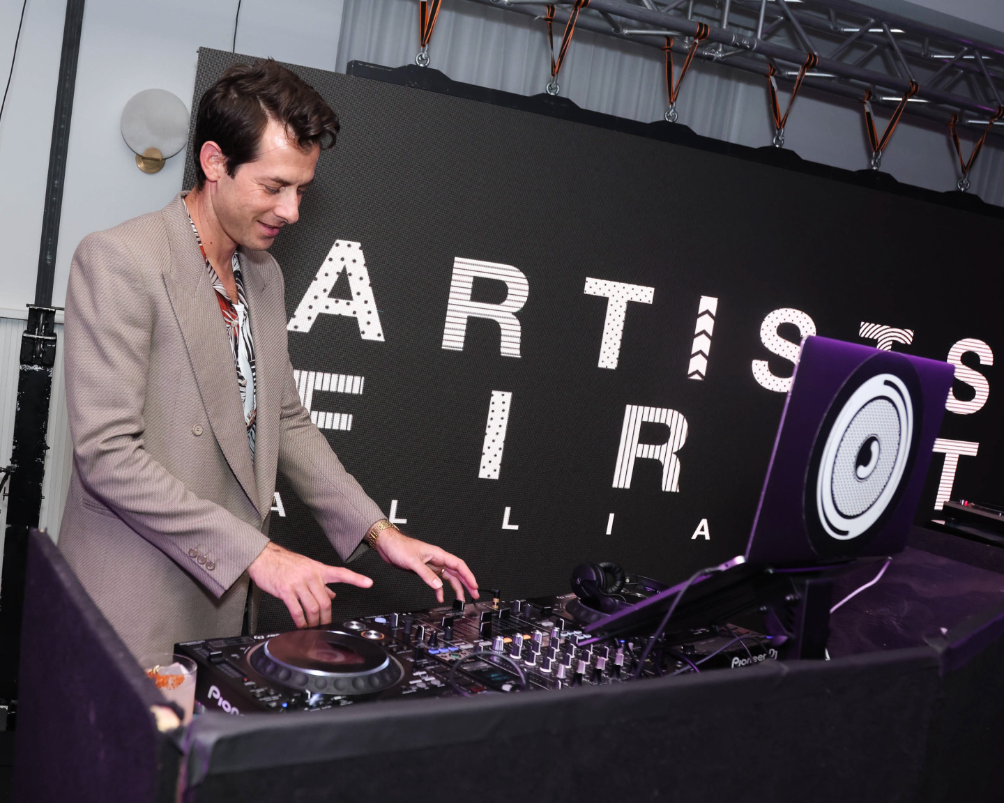 Man in a DJ booth.