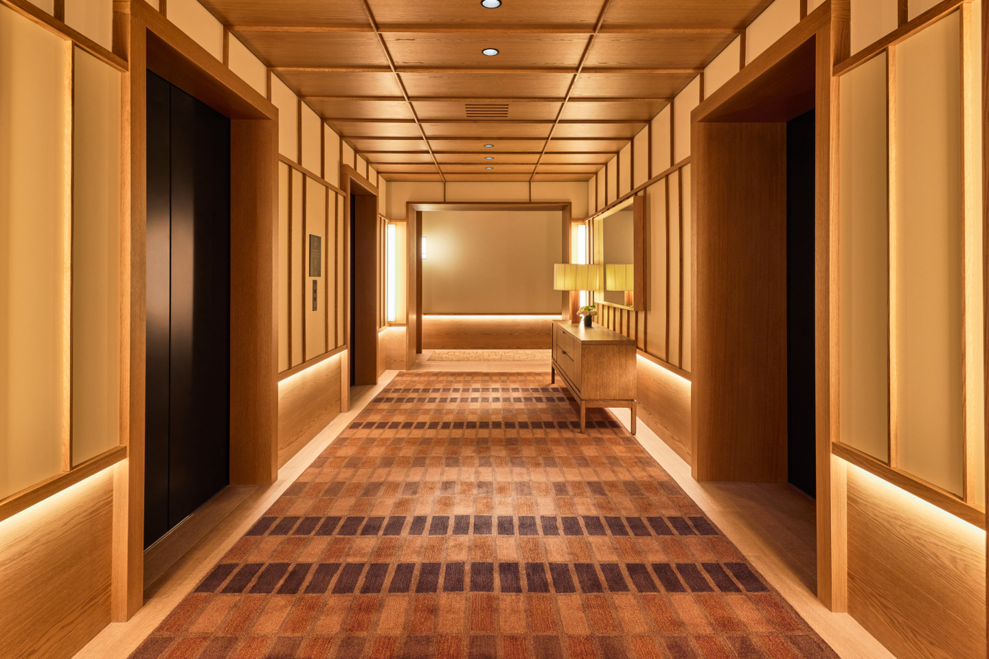 An elevator landing at a hotel.