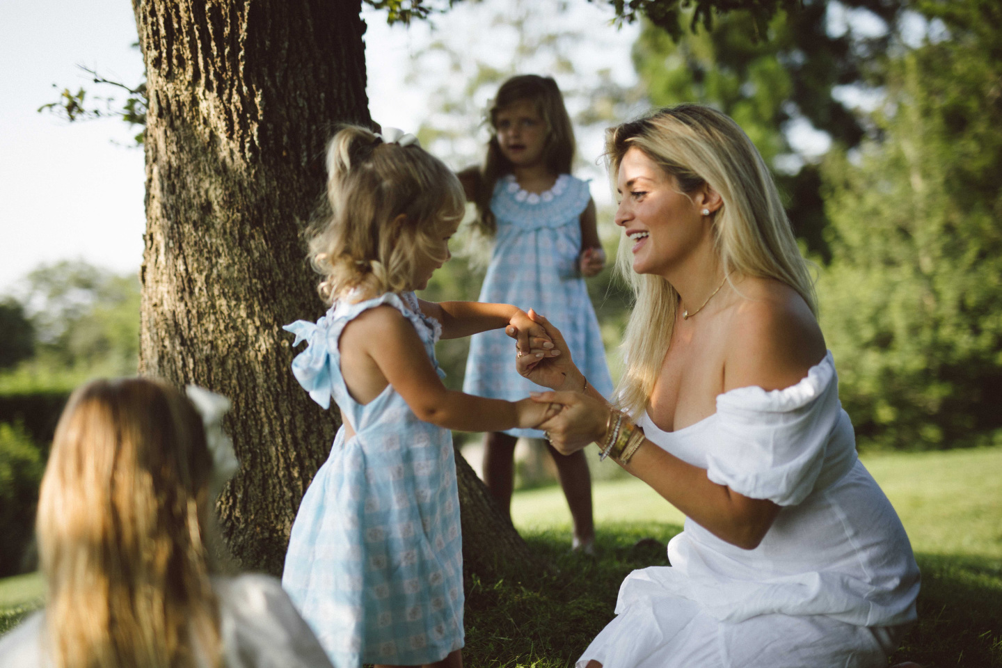 woman and kids outside