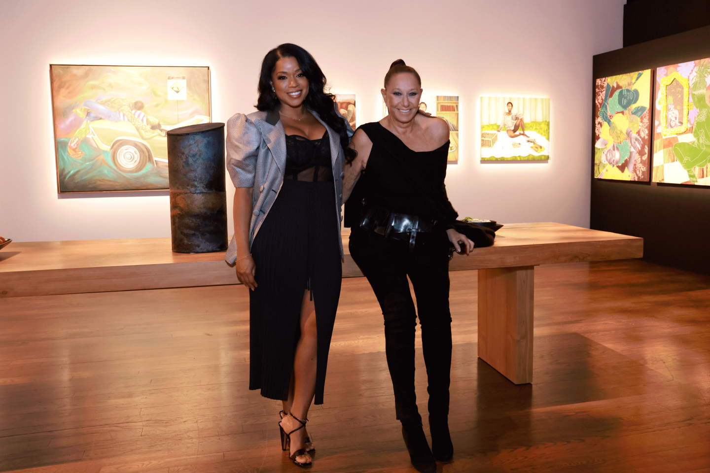 two women in exhibition space