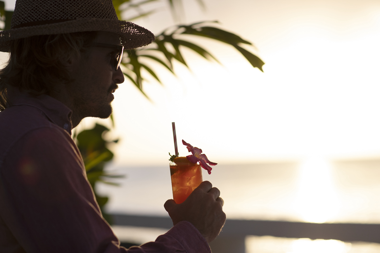 profile of man with a drink
