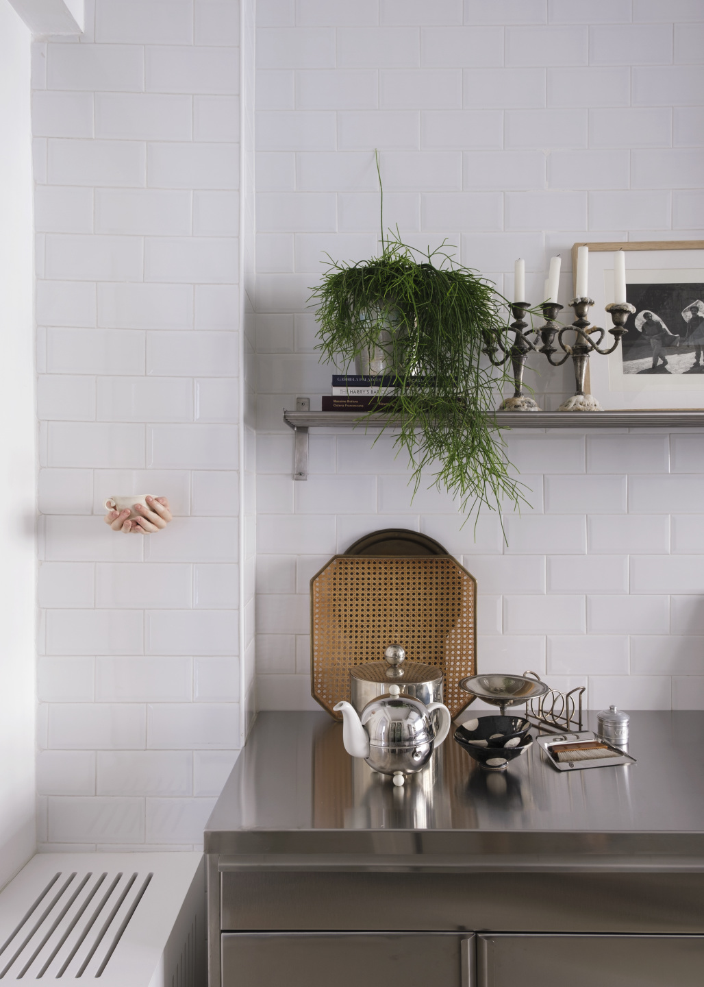 Artwork in the kitchen of a home.