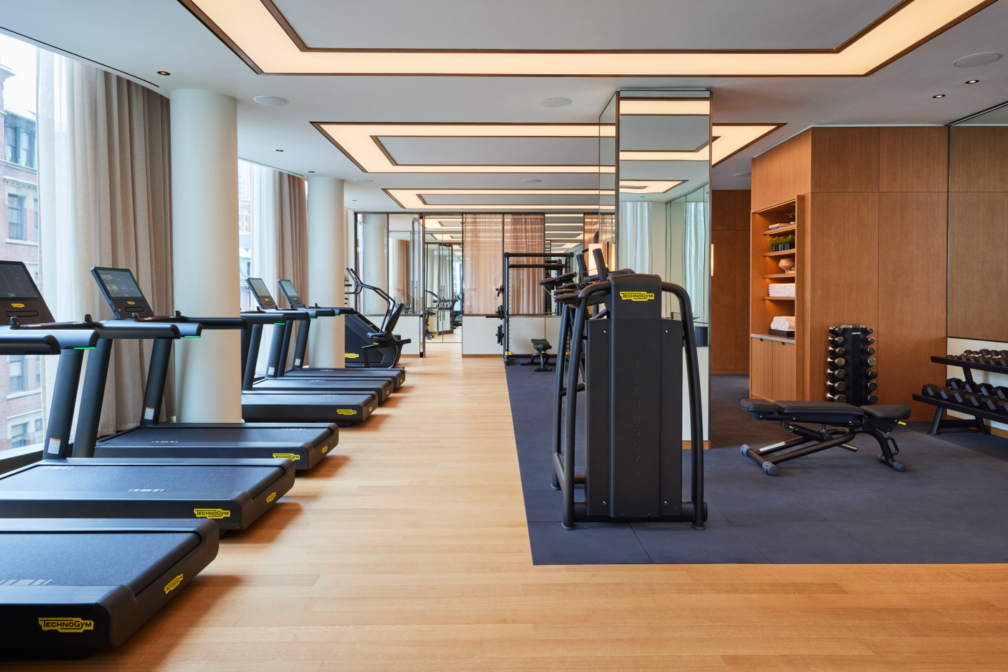 Treadmills and gym equipment at a hotel.