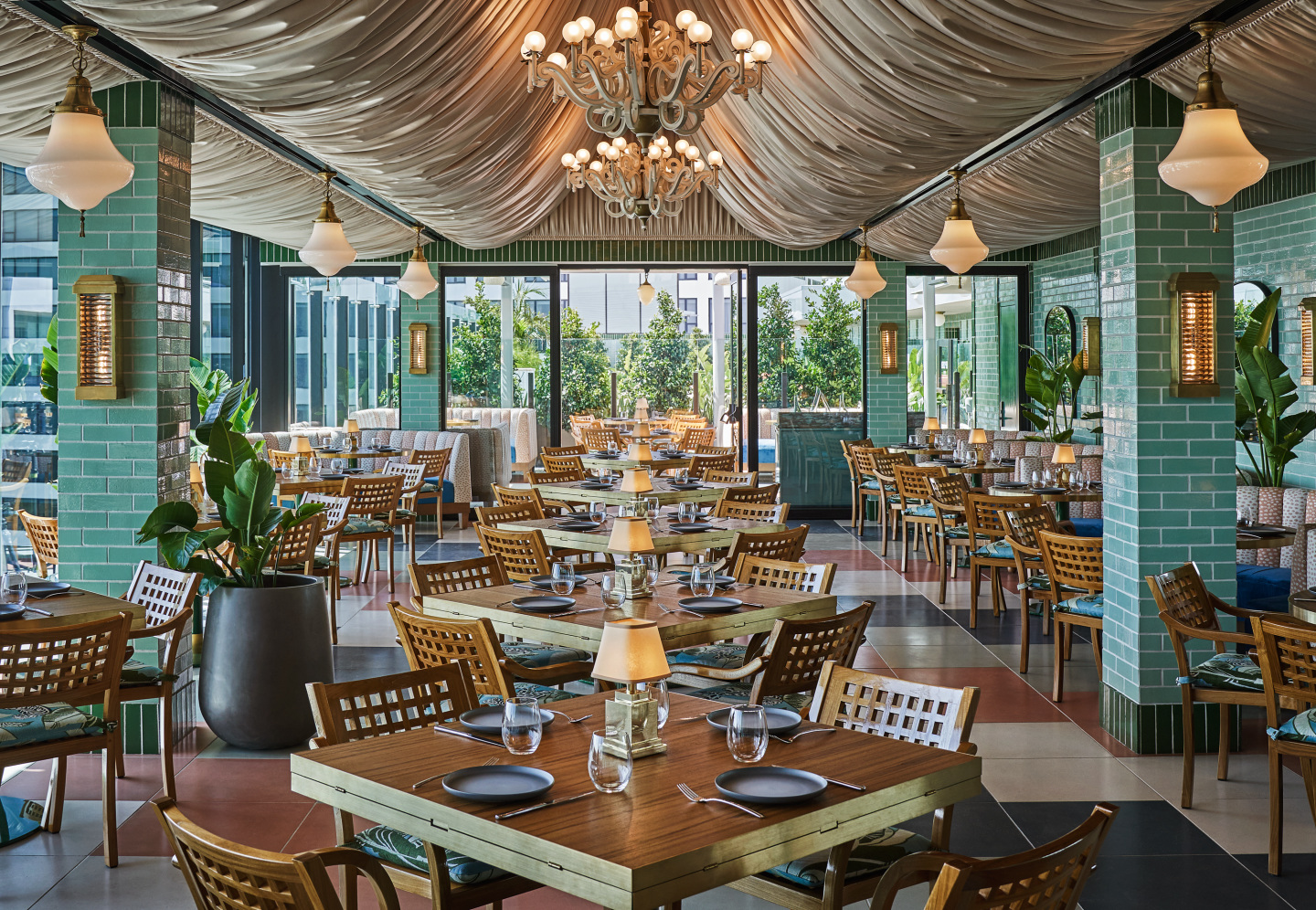 A beautiful restaurant with chandeliers.