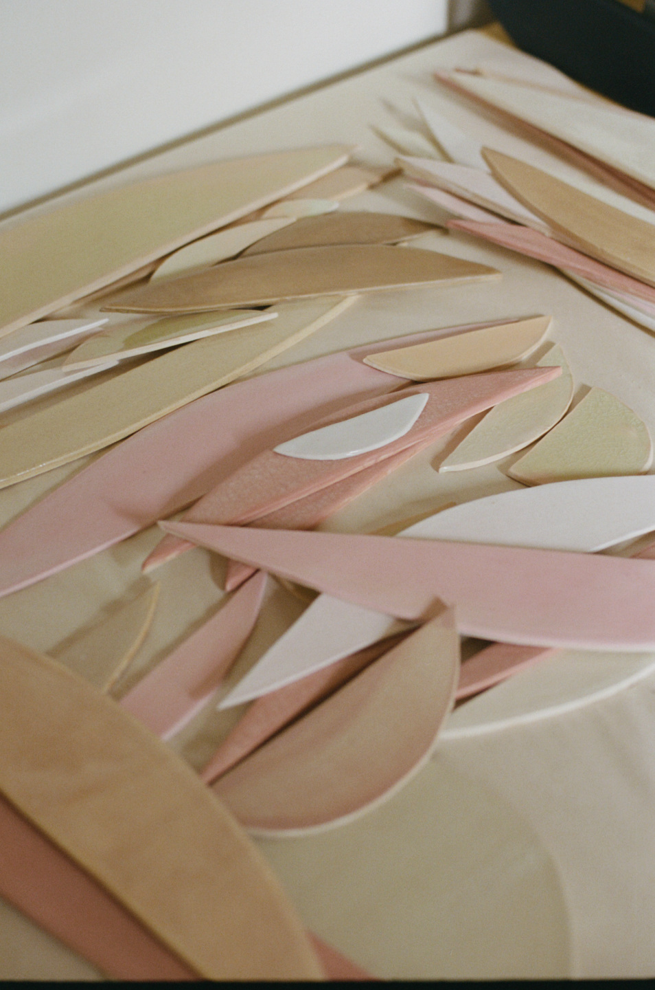 Cutout pieces of multi-colored wood