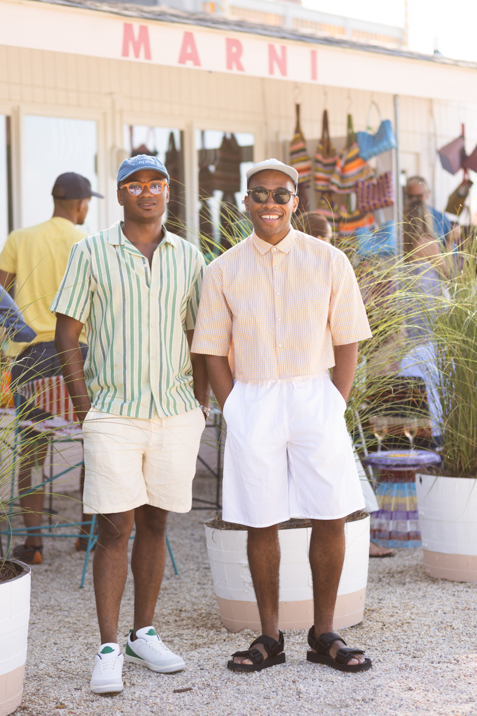 two men stand side by side