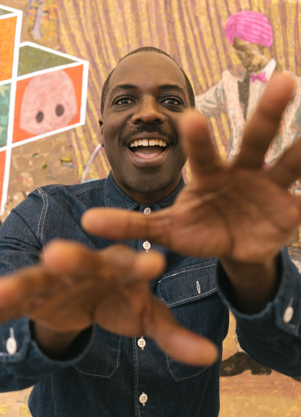 man with hands to camera