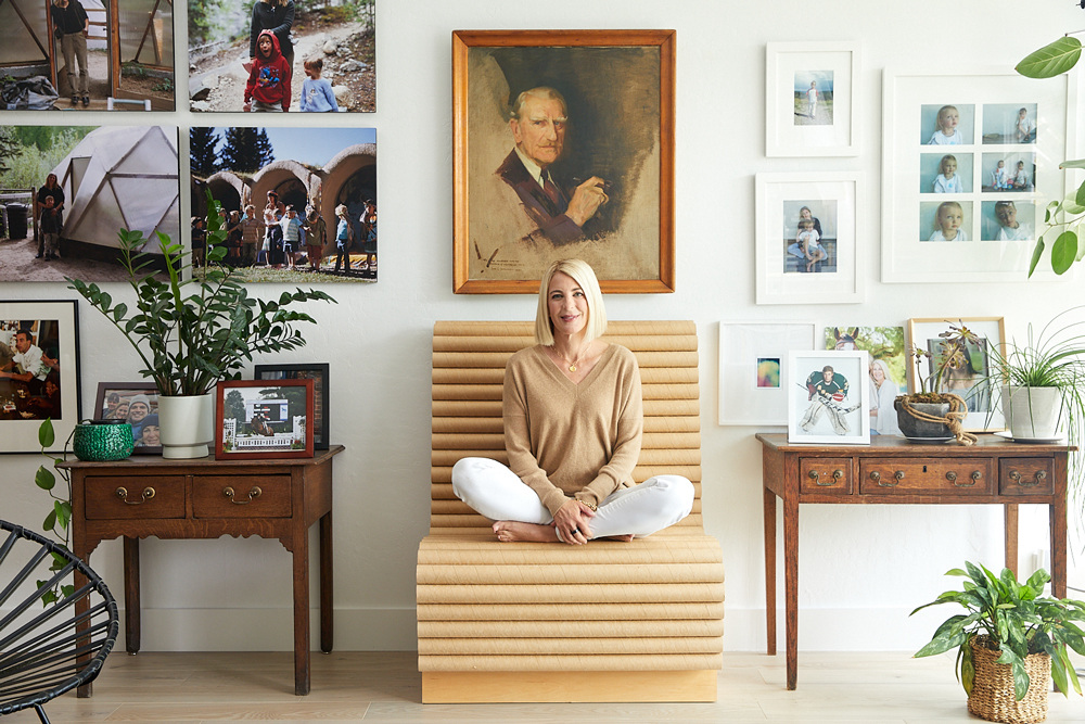 Zuckerman in a seat designed by Shigeru Ban. On the wall are family photos by Doug Aitkin and Rineke Dijkstra, and work by Nan Goldin. All photography courtesy of Heidi Zuckerman and Brende Marshall.