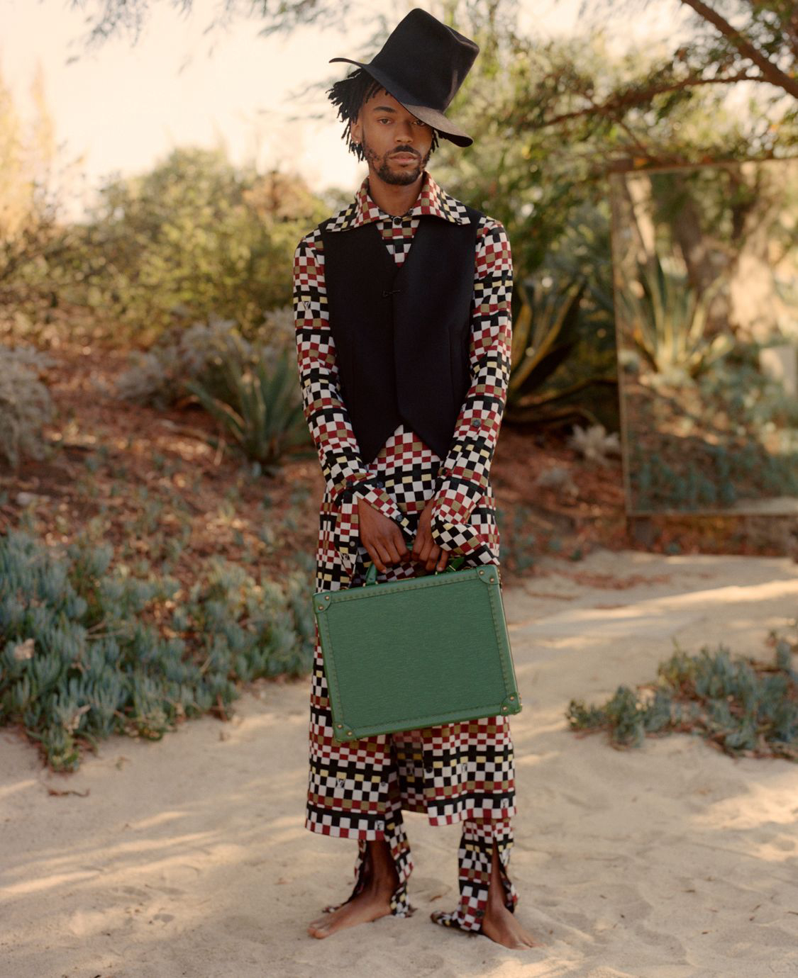 man standing with bag