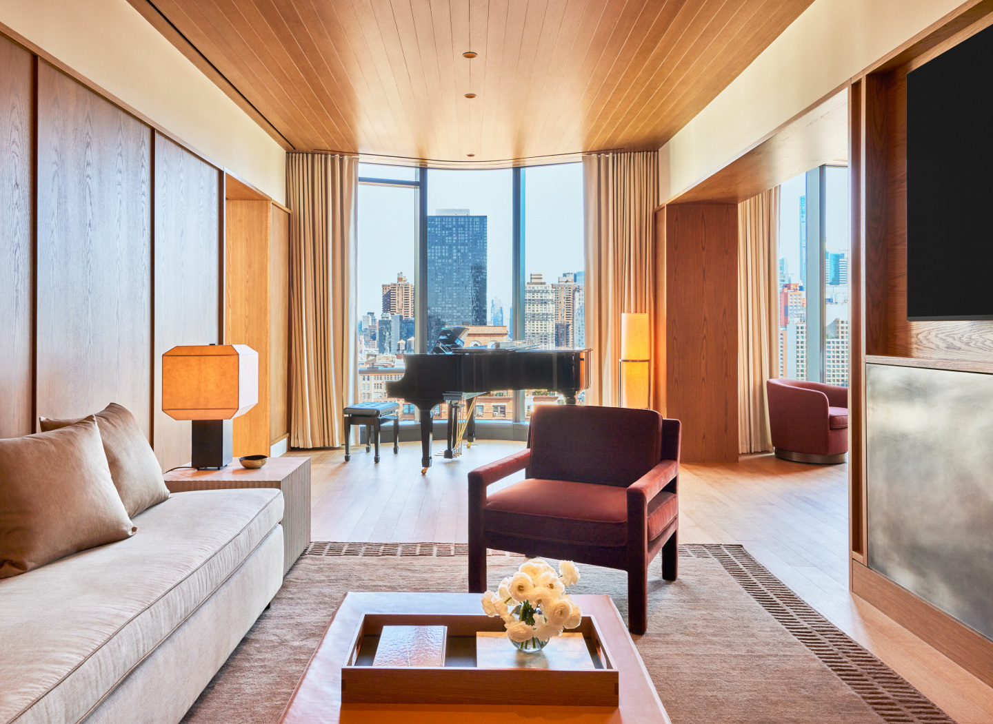 A suite living room in a hotel.