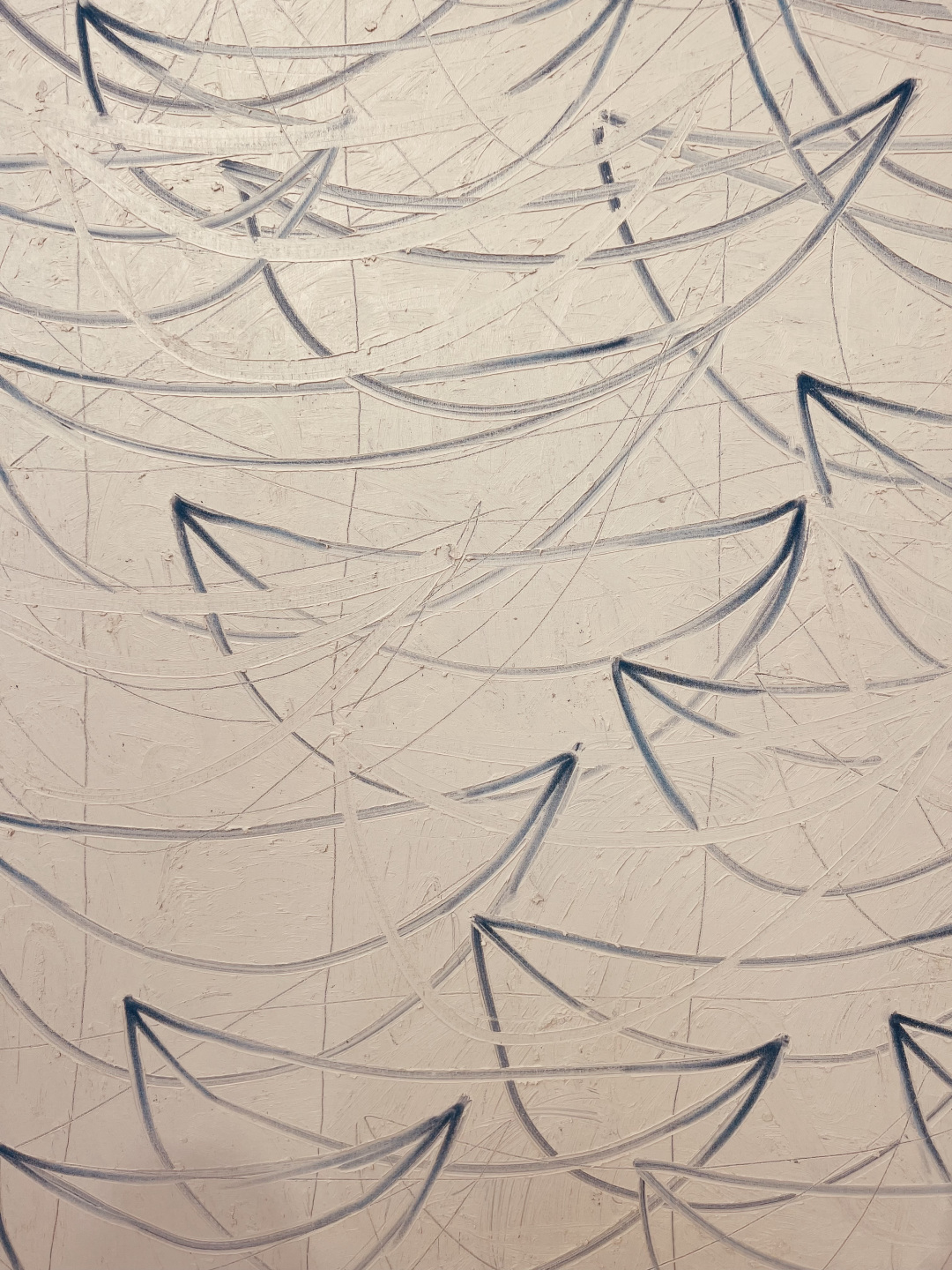 Close up image of blue and white boat painting.