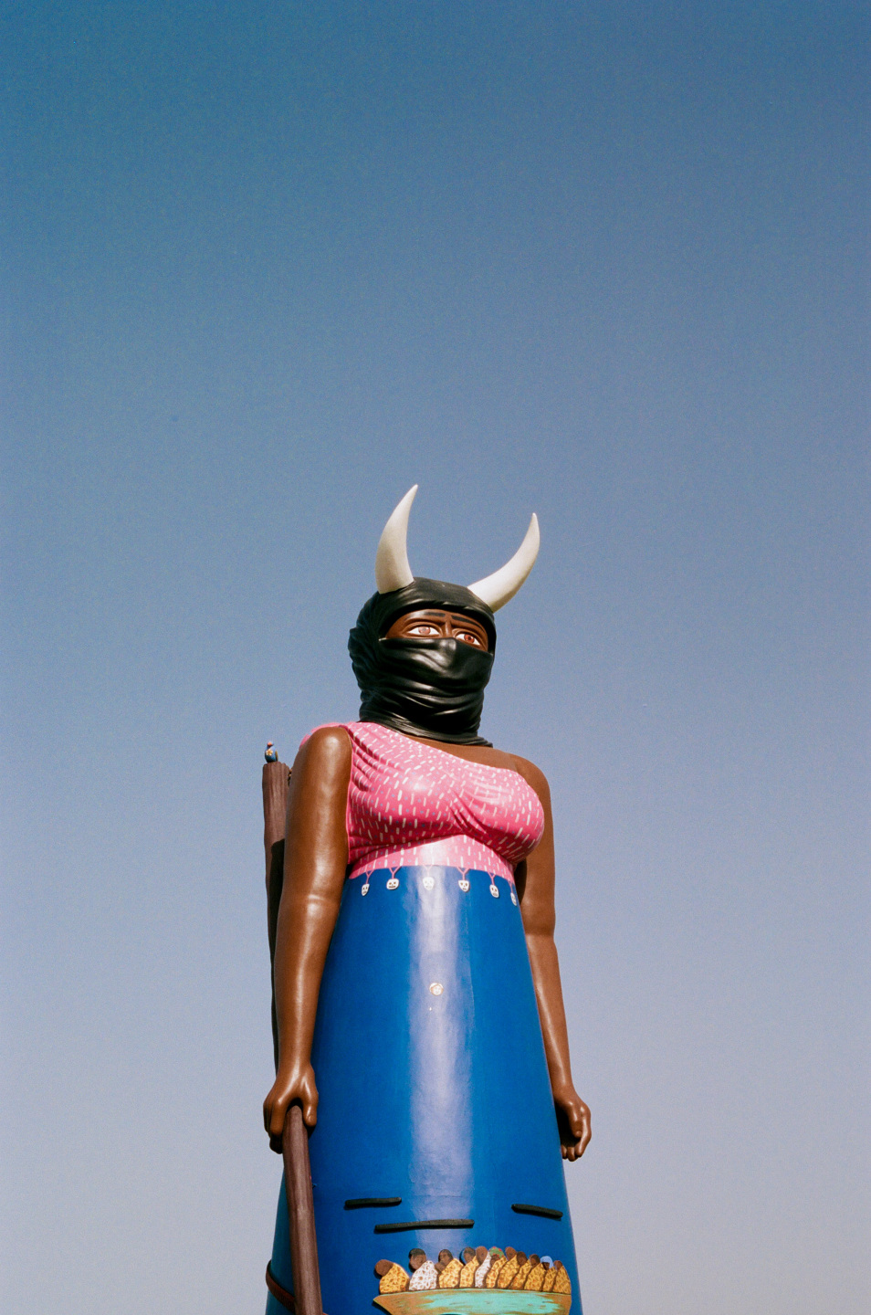 woman with horns sculpture
