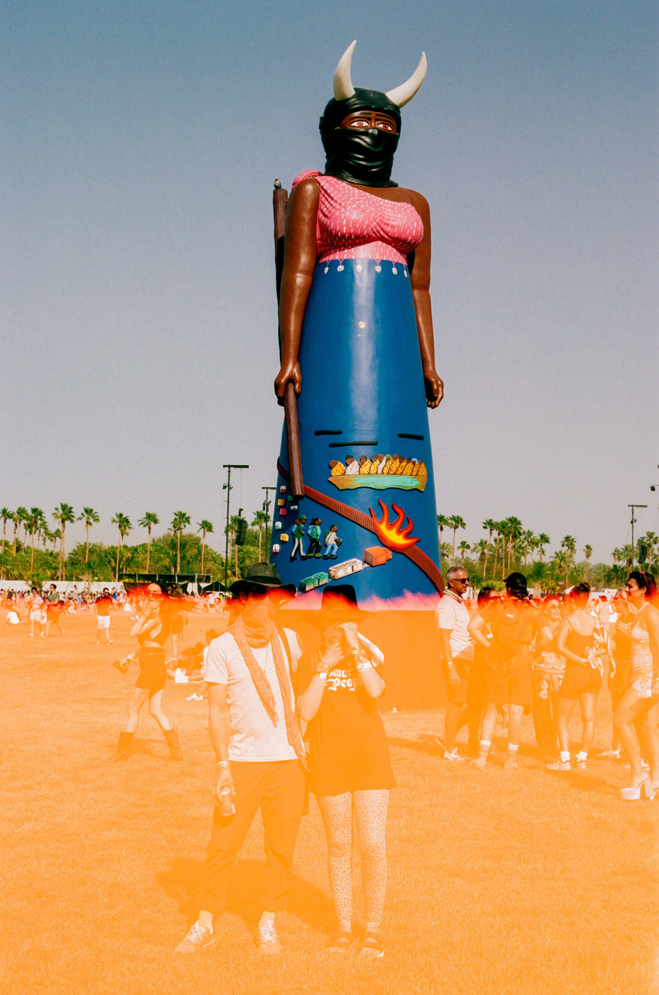 two people with sculpture