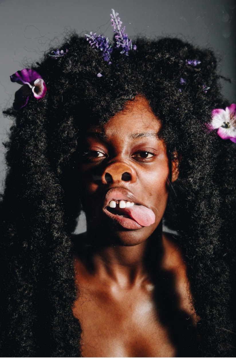 woman with nose to glass