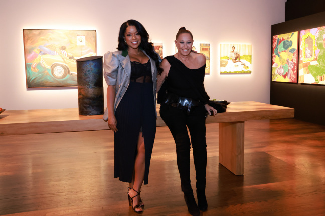 two women in exhibition space