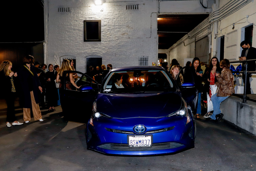 car with people in lot