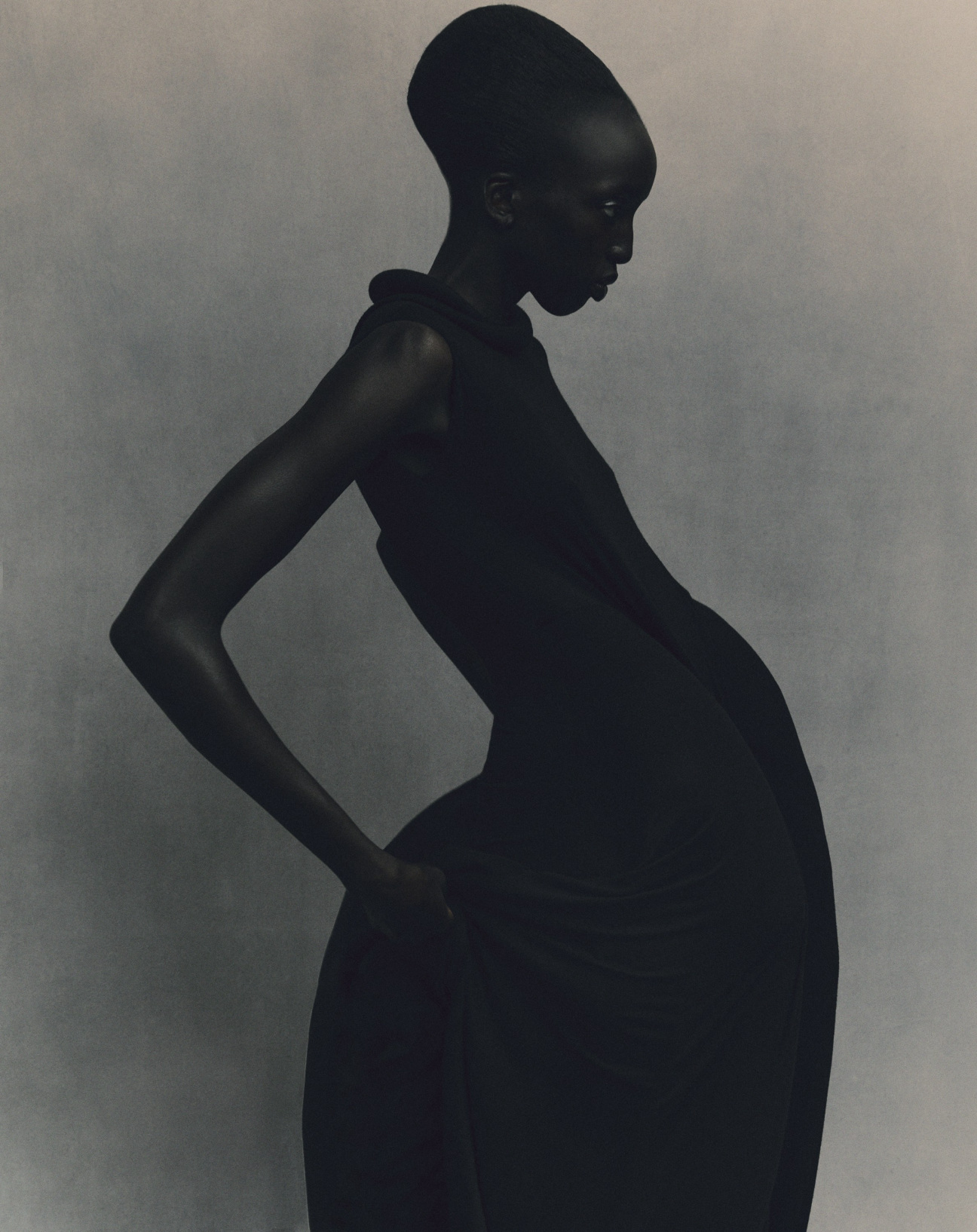 Standing-Ground-Nyaueth-Riam-black-dress