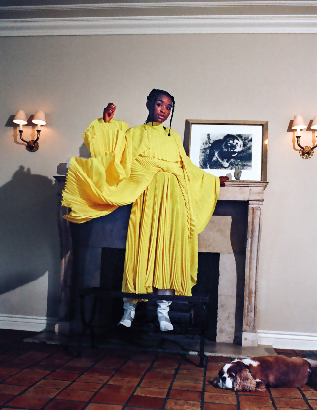 girl standing in fireplace
