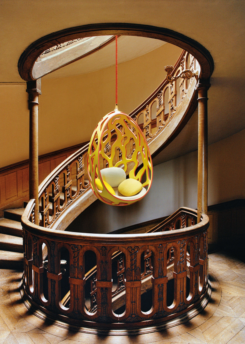 chair hanging in stairwell