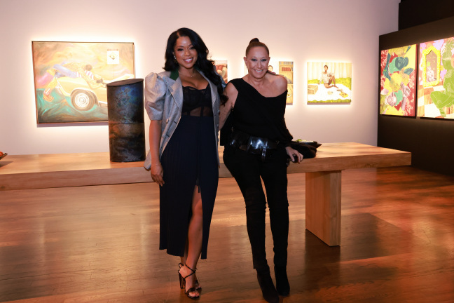 two women in exhibition space