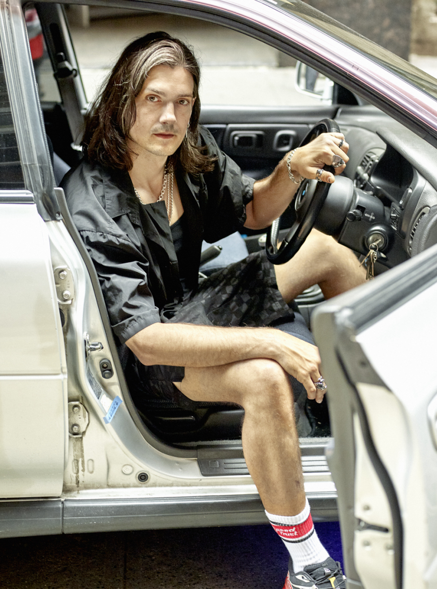 man in car