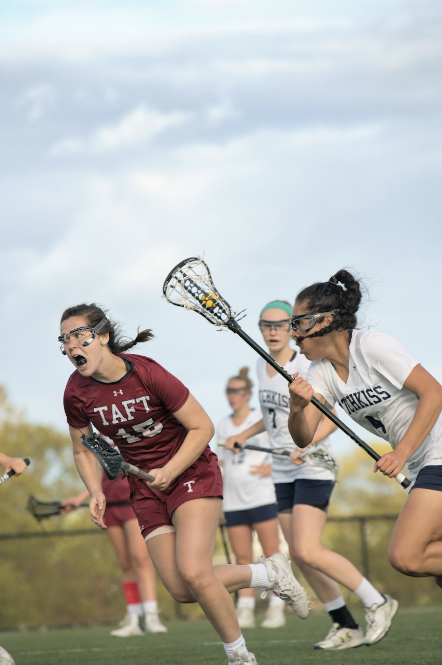 Girls-playing-lacrosse