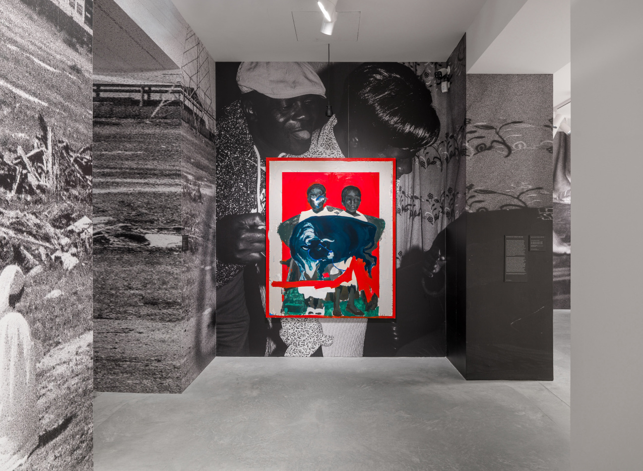 installation of painting on black and white graphic ground