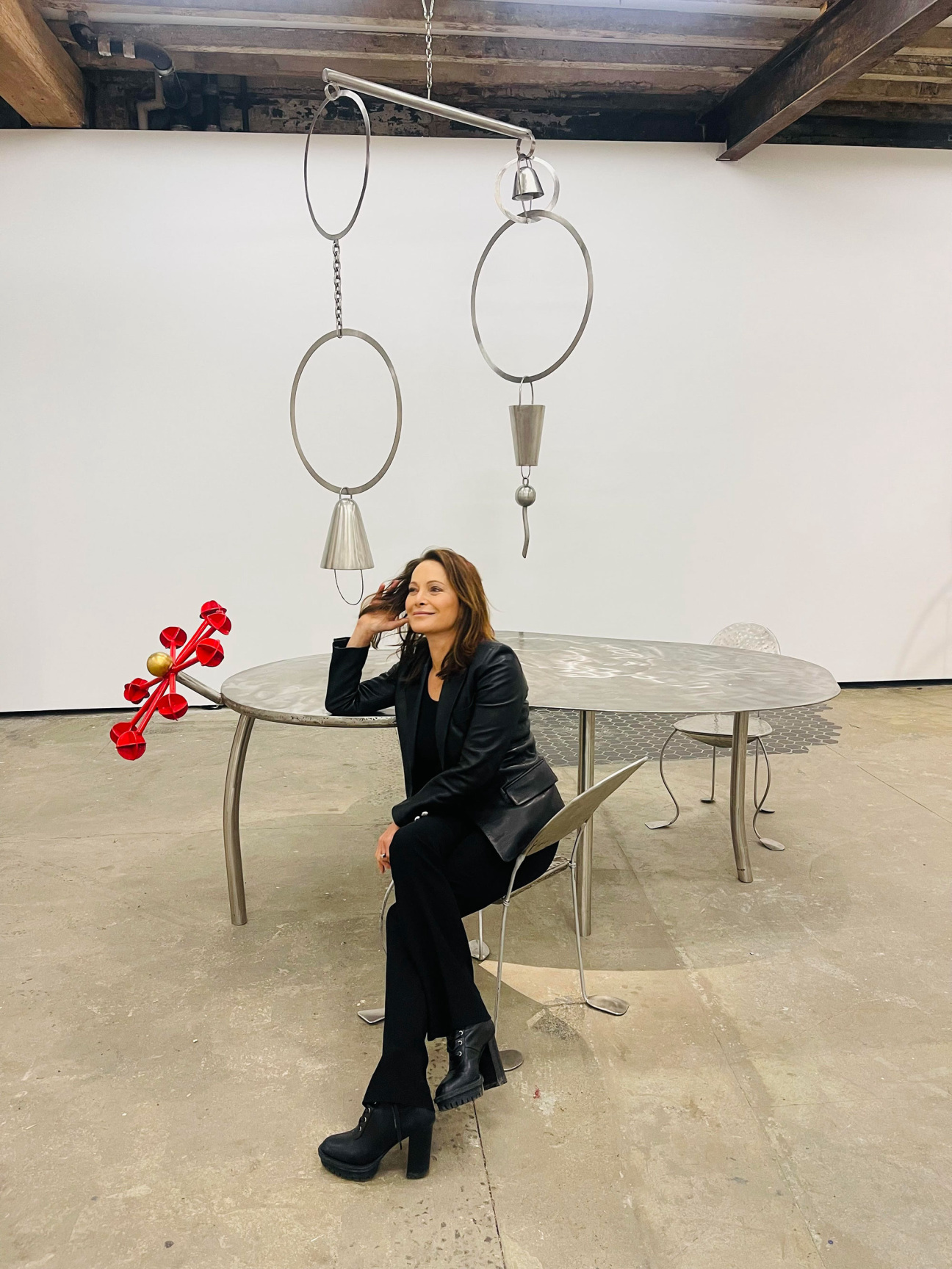 Woman sits at table