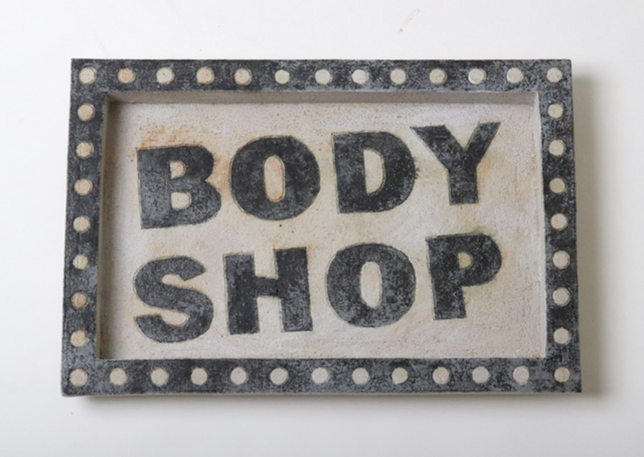 Eric-Roinestad-Sculpture-With-Body-Shop-Text