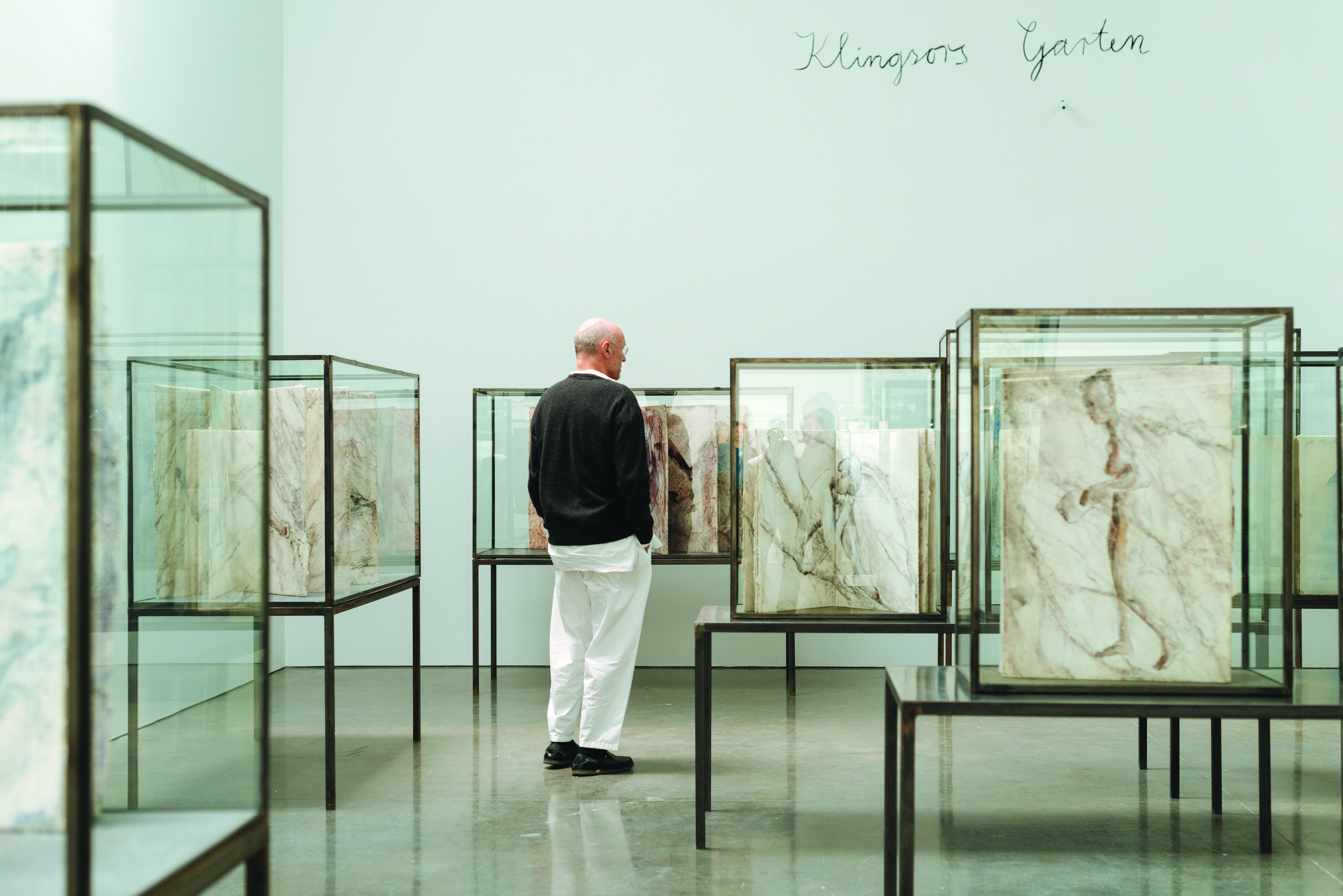 Anselm Kiefer in front of <em>Schlange (Snake)</em> at Gagosian Gallery. Photography by Charlie Rubin. ” width=”5394″ height=”3600″><figcaption>Anselm Kiefer in front of <em>Schlange (Snake)</em> at Gagosian Gallery. Photography by Charlie Rubin. </figcaption></figure>
</p><p>A jumble of contradictions bound up together under an old-fashioned European workers cap, Anselm Kiefer is at <a href=