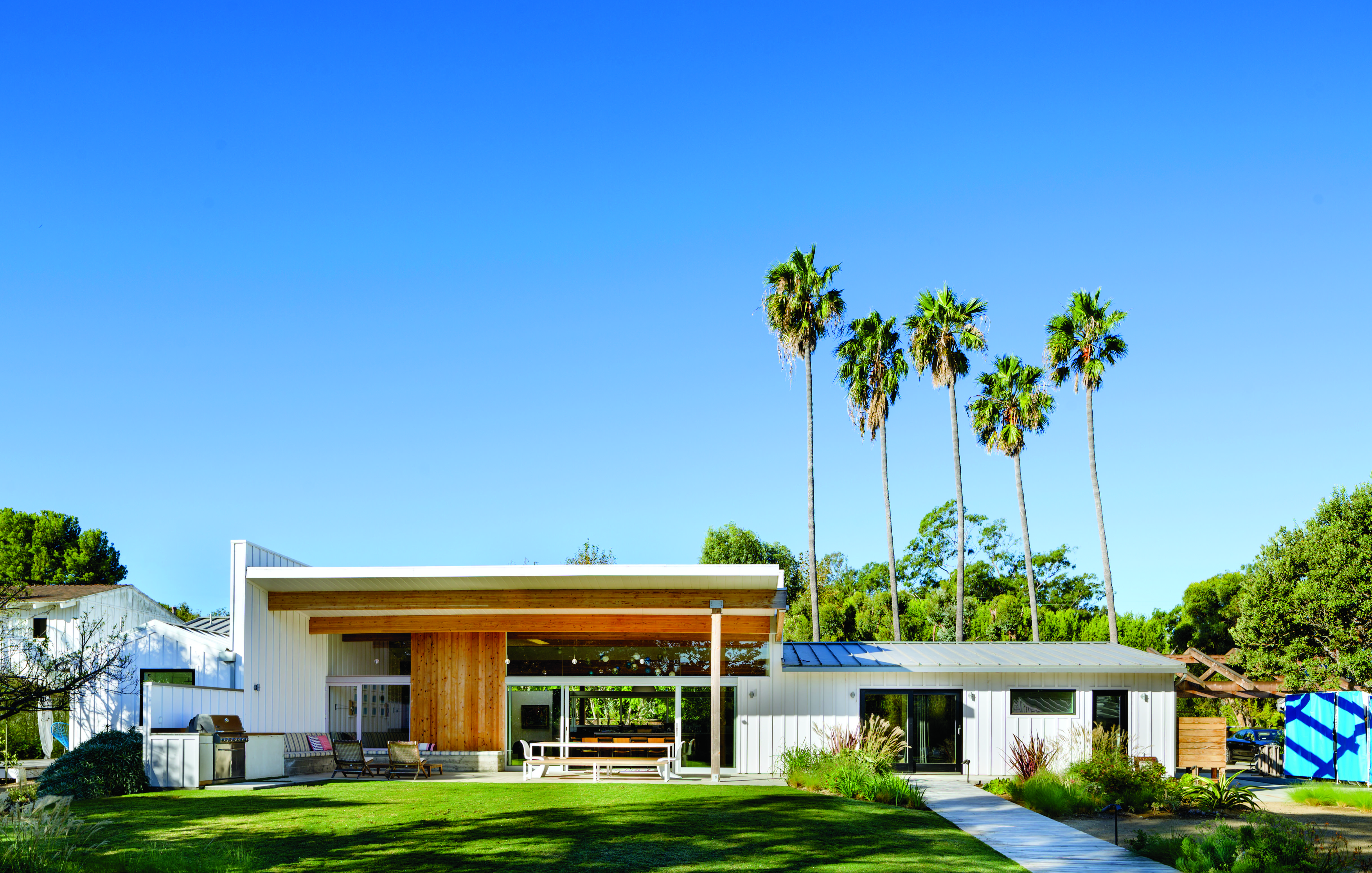 For a private residence in Malibu, Barbara Bestor renovated and united three disparate structures on the property, creating an indoor/outdoor living concept.