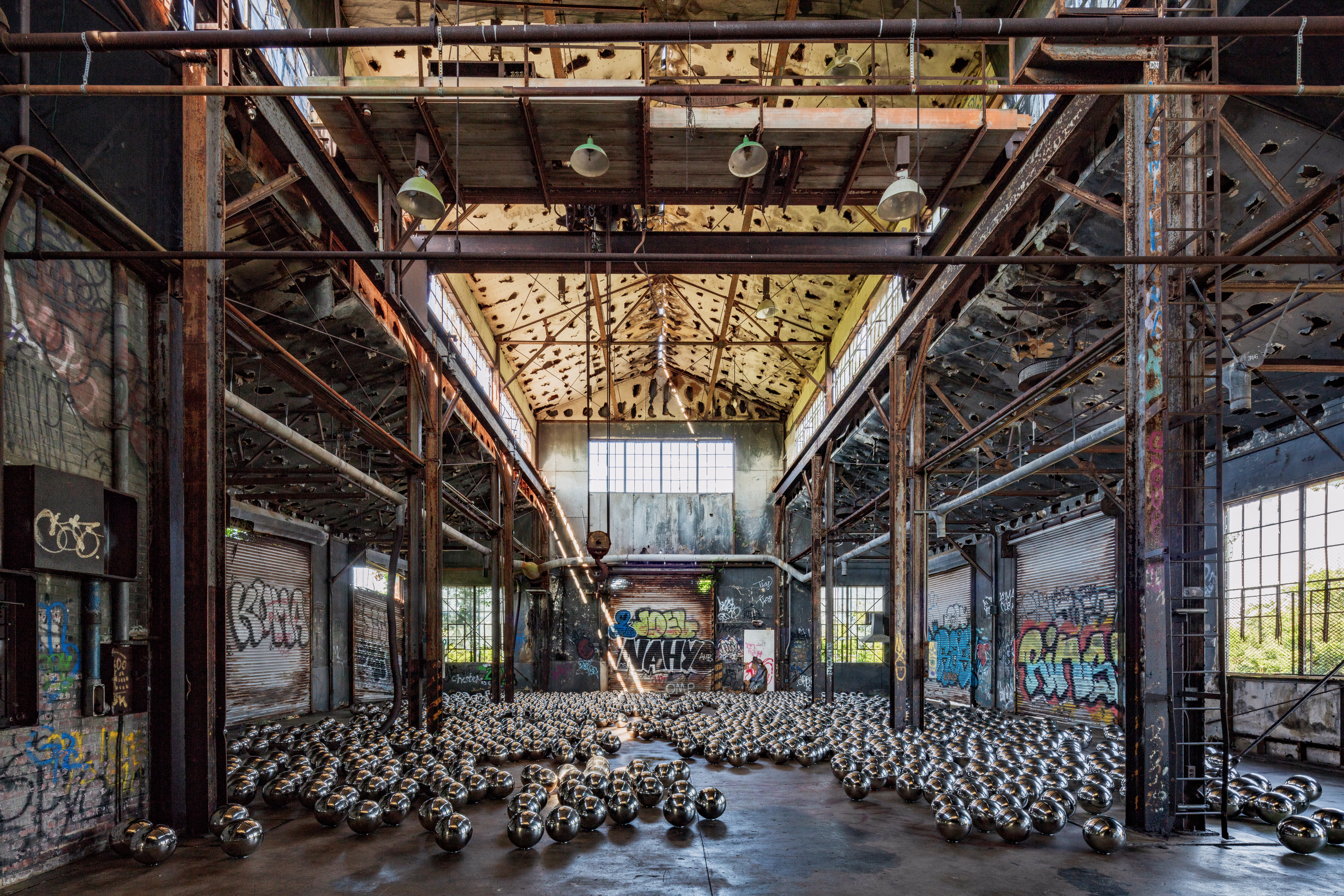 Rockaway! 2018 featuring a site-specific installation of Narcissus Garden by Yayoi Kusama. Artwork ©YAYOI KUSAMA. Artwork courtesy Ota Fine Arts, Tokyo/Singapore/Shanghai Victoria Miro, London/Venice and David Zwirner, New York.