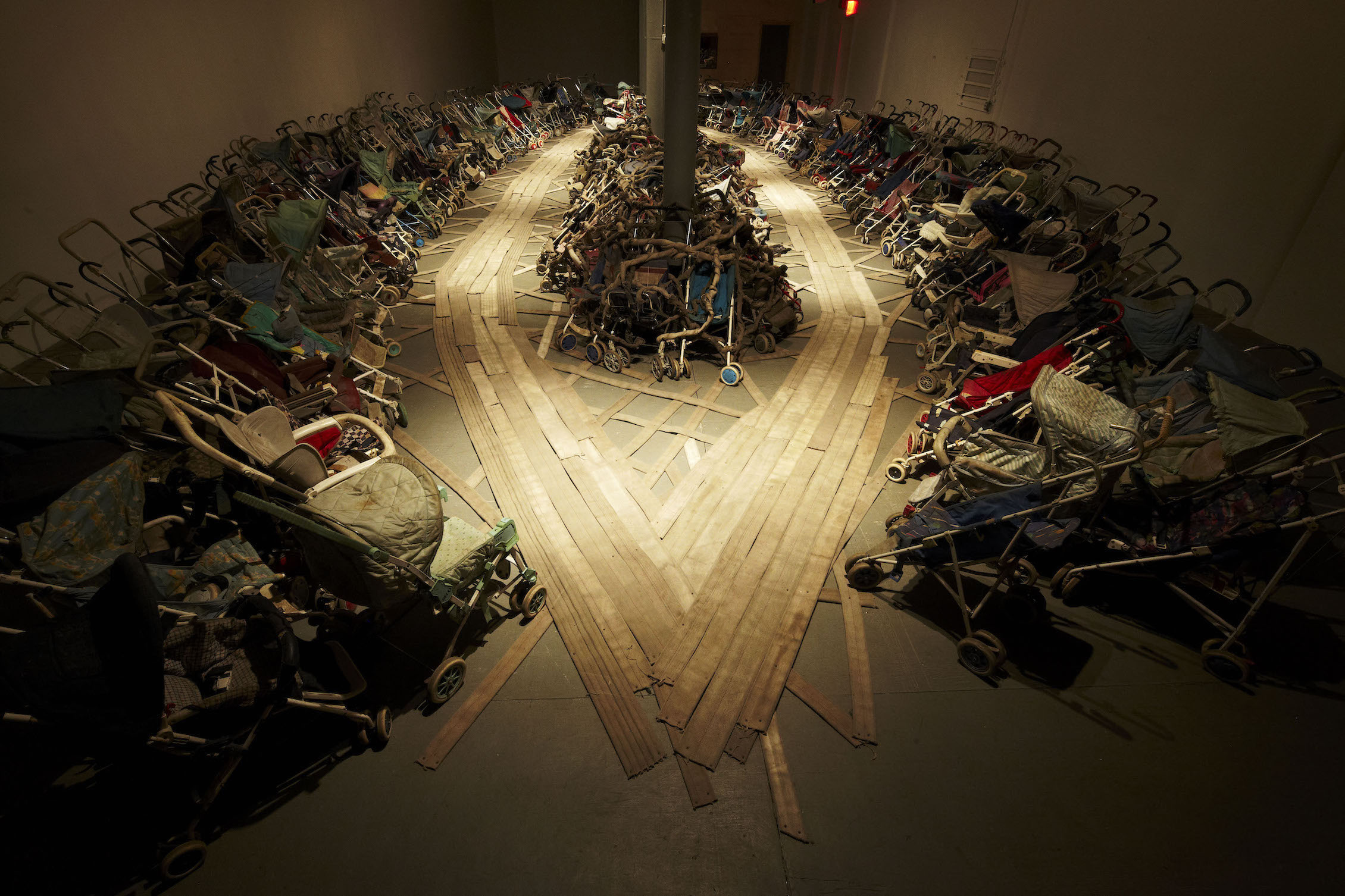 Nari Ward, <i>Amazing Grace</i> (1993). Approx. 300 baby strollers and fire hoses, dimensions variable. Installation view: “NYC 1993: Experimental Jet Set, Trash and No Star,” New Museum, New York, 2013. Courtesy the artist and Lehmann Maupin, New York, Hong Kong, and Seoul. Photo: Jesse Untracht-Oakner.” width=”2260″ height=”1506″><figcaption>Nari Ward, <i>Amazing Grace</i> (1993). Approx. 300 baby strollers and fire hoses, dimensions variable. Installation view: “NYC 1993: Experimental Jet Set, Trash and No Star,” New Museum, New York, 2013. Courtesy the artist and Lehmann Maupin, New York, Hong Kong, and Seoul. Photo: Jesse Untracht-Oakner.</figcaption></figure>
</p><p>“I consider myself a weaver in many ways,” says New York-based artist Nari Ward, whose survey <span style=