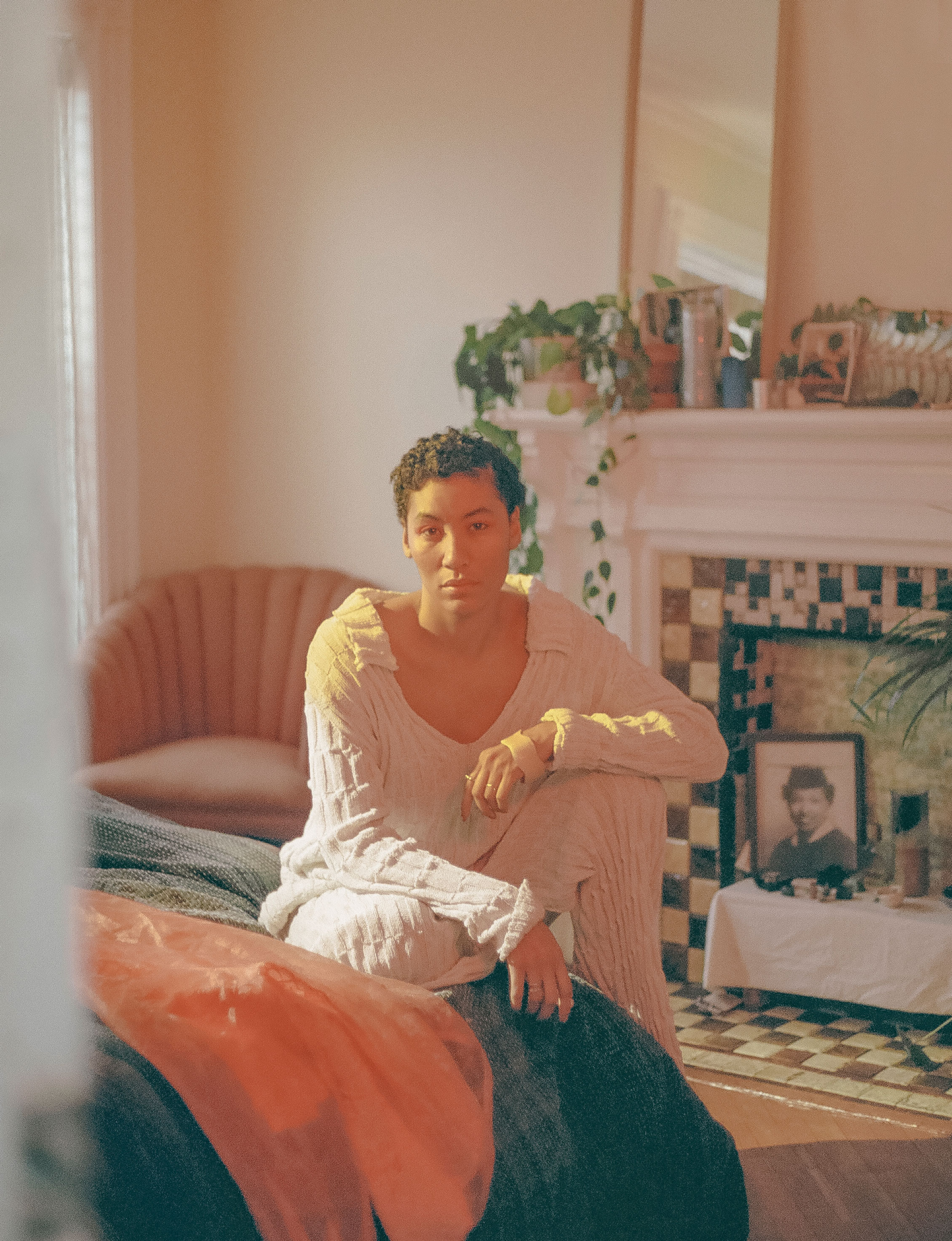 Naima Ramos-Chapman in her Brooklyn bedroom wearing Gauntlett Cheng’s Paper Polo and Paper Sweats from their Spring/Summer 2019 collection.