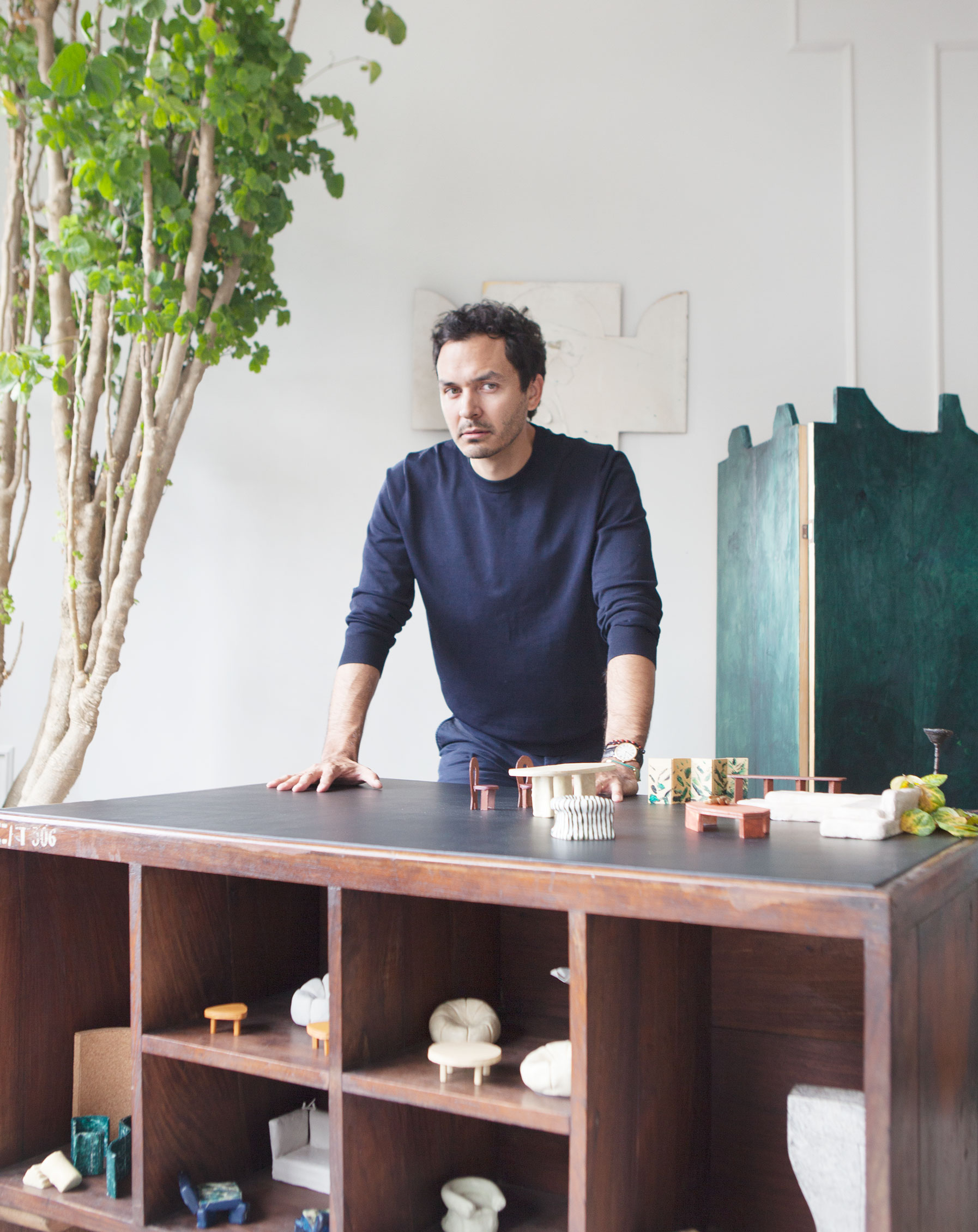 Designer Giancarlo Valle with some of his models. 