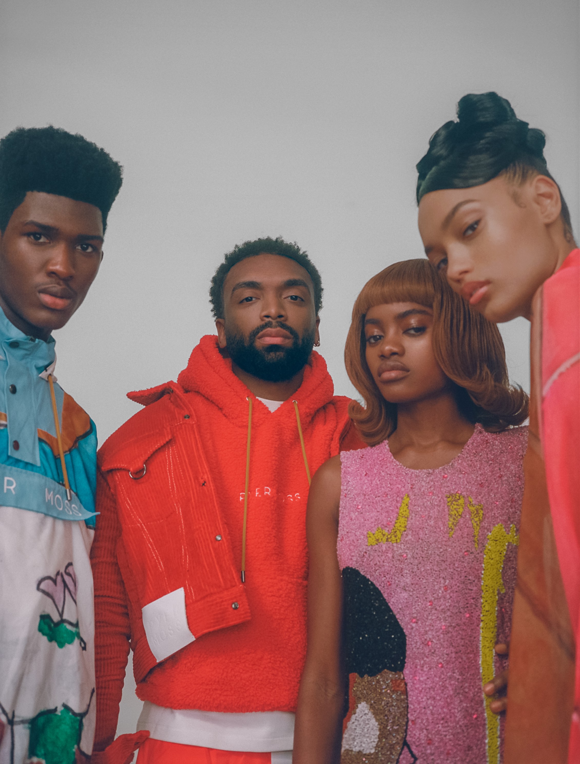 Anarcius Jean, Kerby Jean-Raymond, Elizabeth Ayodele and  Lameka Fox wearing Pyer Moss SS19.
