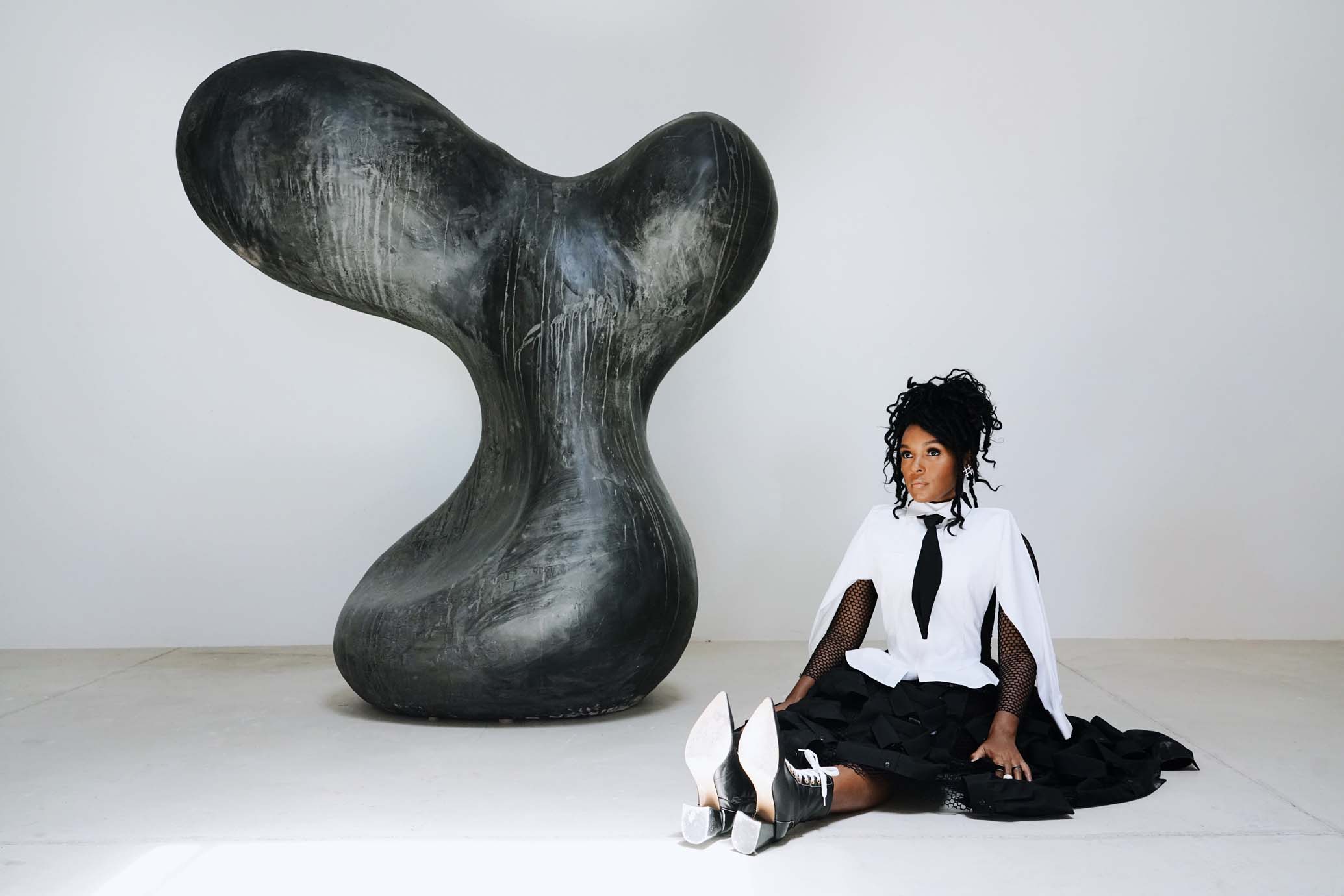 Styling by  ALEXANDRA MANDELKORN sculptures by rogan gregory. Monáe wears Jean Paul Gaultier dress Adeam shoes Jenny Bird earrings Tuleste rings.