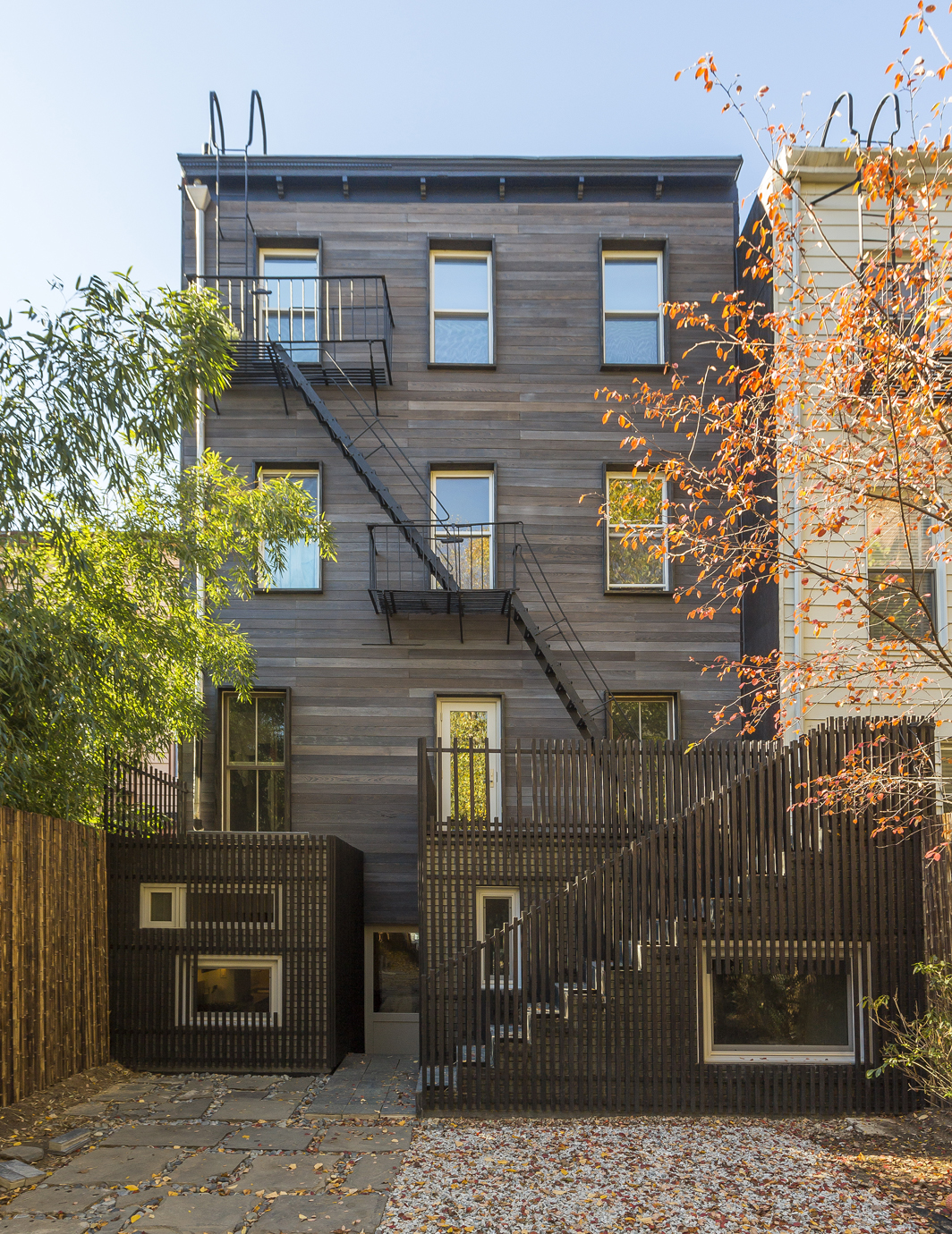 In 2016 Architensions completed this expansion and renovation of a townhouse in Brooklyn, cladding its exterior in shou sugi ban, a Japanese charred-wood siding.