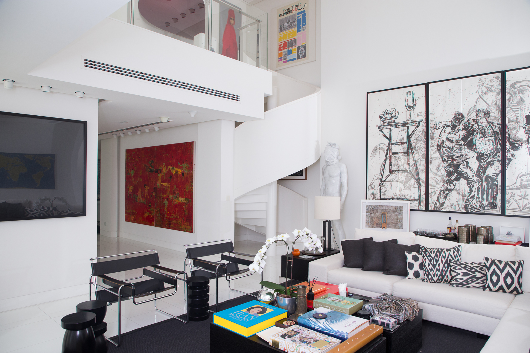 Mohammed Afkhami's living room features contemporary works by Reza Derakshani and Reza Aramesh. All photograph courtesy of Mohammed Afkhami Foundation